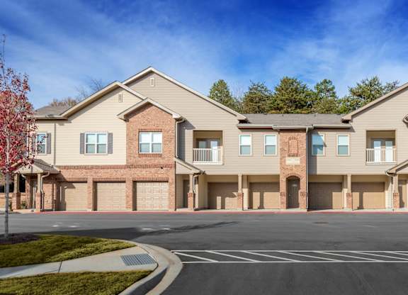 an empty parking lot in front of an apartment building at Echo at Lake Norman, Mooresville
