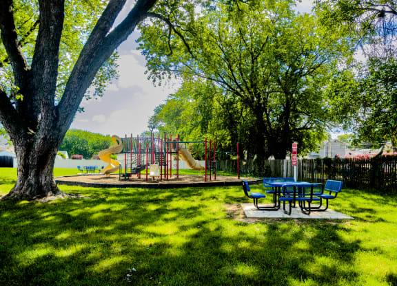 a park with a playground and a picnic table at Glen Hollow, Pennsylvania