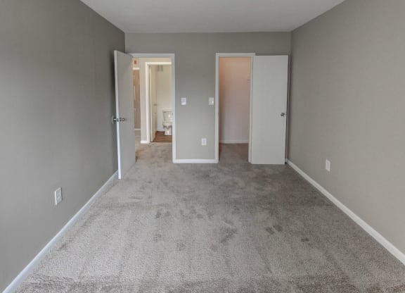 a empty room with a carpeted floor and grey walls at Stepny Place, Rocky Hill, 06067