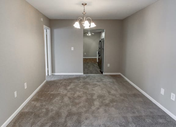living room with carpeting and a hallway with a door to a bedroom at Stepny Place, Rocky Hill, CT