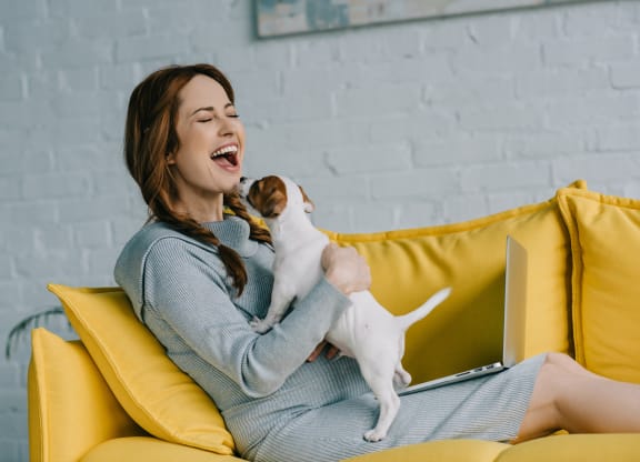 Woman with cute puppy