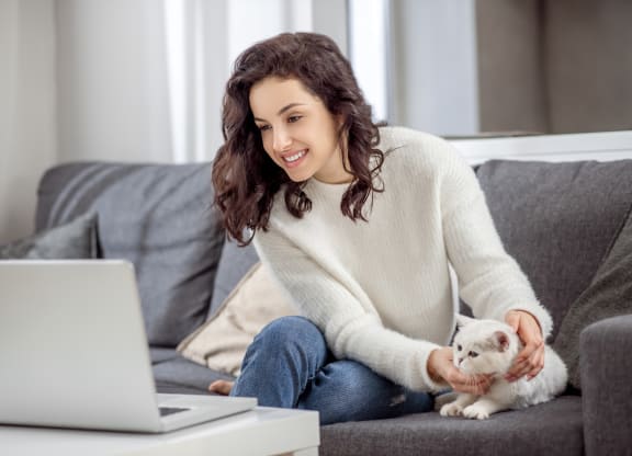 Woman on couch with cat