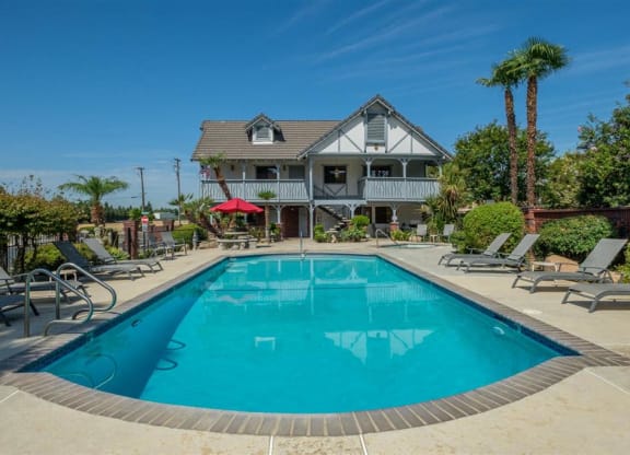Swimming Pool With Relaxing Sundecks at Oxford Park Apartments, California, 93720