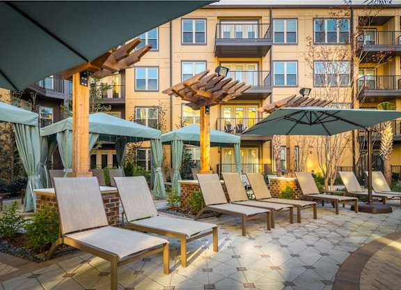 A sunny day at the outdoor seating area of a hotel.