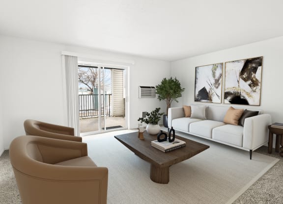 A bright living room with white walls and two glass sliding doors to a private balcony. Staged with a couch, 2 chairs, table and plant.at North Pointe, Post Falls, 83854