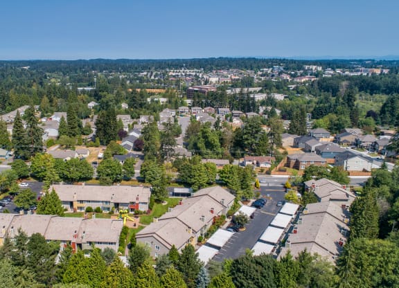 an aerial view of a neighborhood with houses and trees at Quartz Creek, Mountlake Terrace, WA, 98043