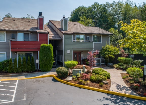 the view of a house with a driveway and landscaping in front of it at Quartz Creek, Washington, 98043