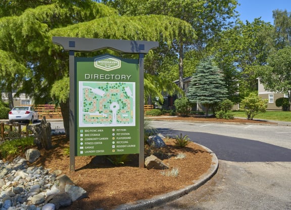 a sign that reads directory in front of a parking lot  at Woodhaven, Everett, WA