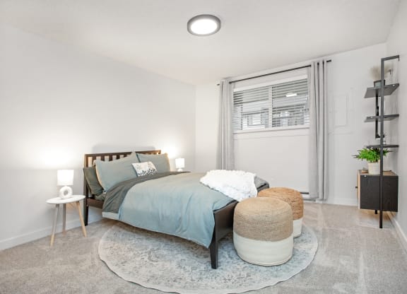 a bedroom with a bed and a rug at Brix, Walla Walla