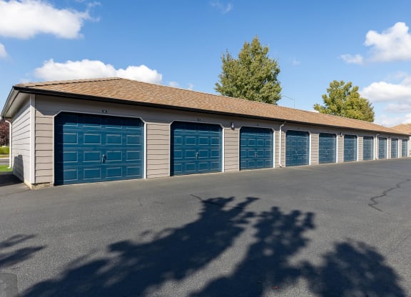 a long row of garages with blue garage doors  at Shoreline Village, Richland, WA, 99352