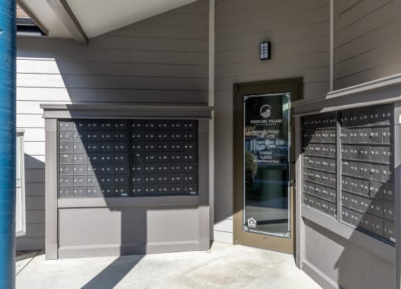 a door to a building with a display of wine glasses  at Shoreline Village, Richland, WA