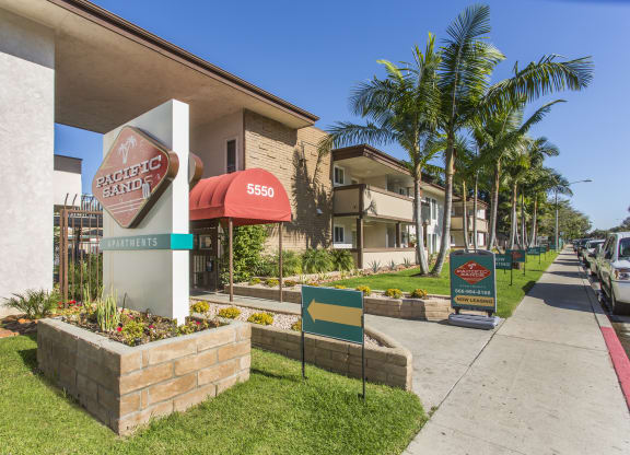 Pacific Sands entrance with tropical landscaping at Pacific Sands, San Diego, CA, 92117