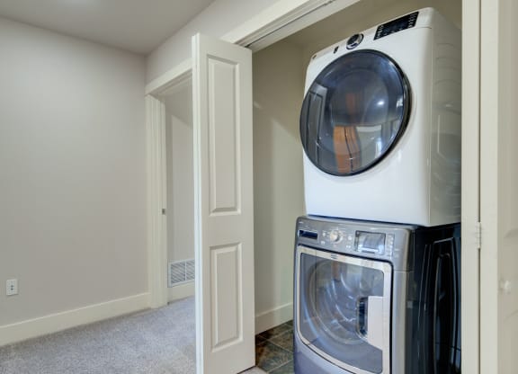 an empty laundry room with a washer and dryer at Copper Pines, Bozeman, MT, 59718