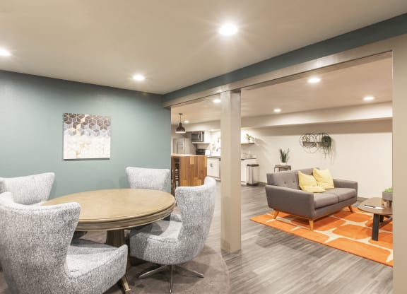 Updated lounge with game table, couch and kitchen.at Cedarwood, Wenatchee, WA 98801