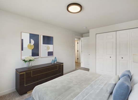 a bedroom with white walls and a large white bed  at Brix, Washington, 99362
