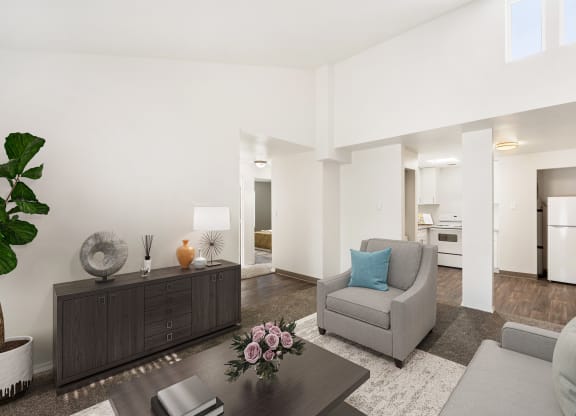 a living room with two couches and a coffee table at Park View Apartments, Wenatchee Washington