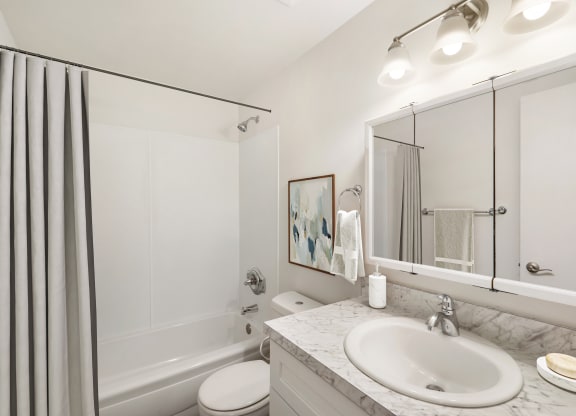 a bathroom with a bathtub and a sink at Park View Apartments, Washington, 98801
