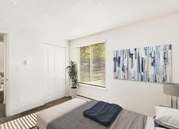 a bedroom with a bed and a window at Park View Apartments, Wenatchee, 98801