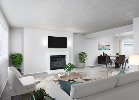 a living room with a white couch and a fireplace