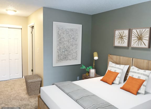 a bedroom with a white bed and two pictures on the wall at Woodland Crossing , California