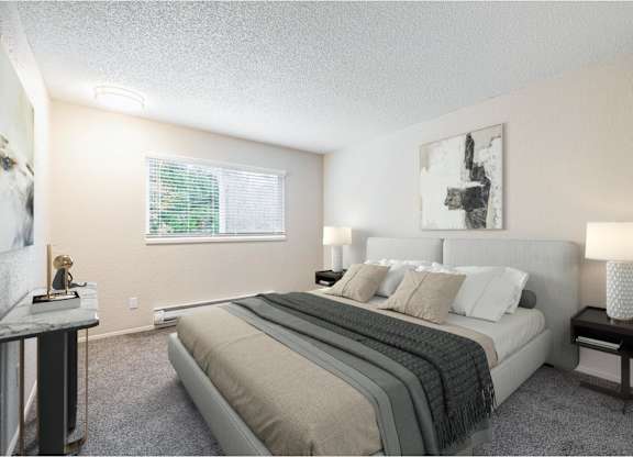 Two-bedroom apartment bedroom at Peak 88 Apartments in Renton, WA with neutral tones and natural light