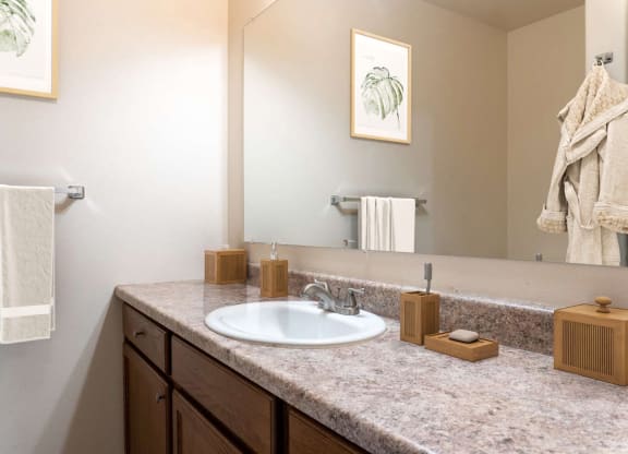 Bathroom with dark cabinets at Pine Tree Park, Kennewick