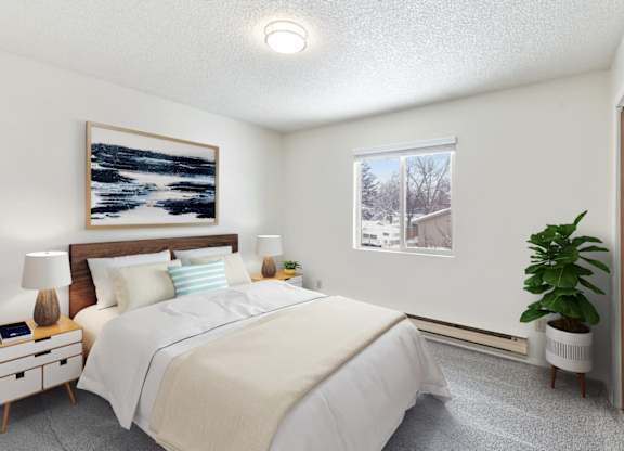 A bedroom with a large bed, a nightstand with a lamp, and a painting on the wall.