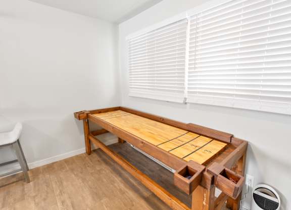 Resident lounge game area at Rock Creek Apartments in Billings, MT.