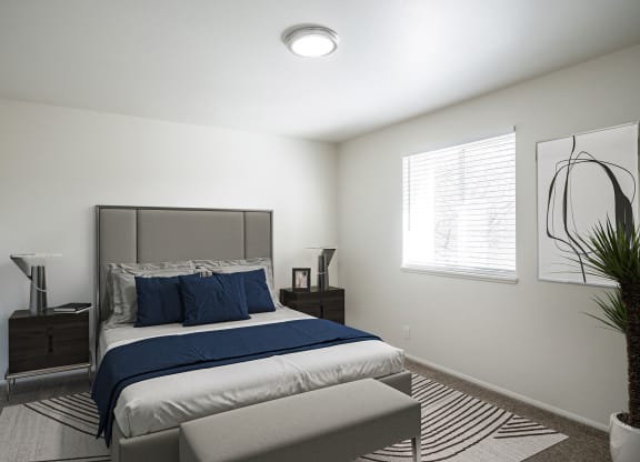 a bedroom with a bed and two night stands at Summit, Pocatello, ID