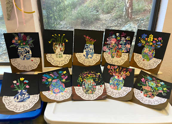 Colorful floral vase art display on windowsill at Hilltop Commons Senior Living Apartments, Grass Valley, CA