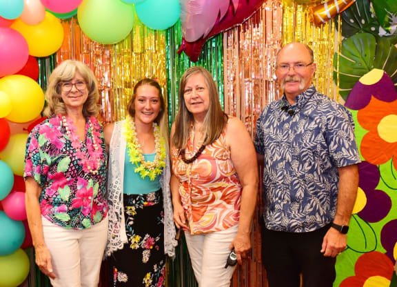 a group of people at a party with balloons at River Commons Senior Living, Redding, CA