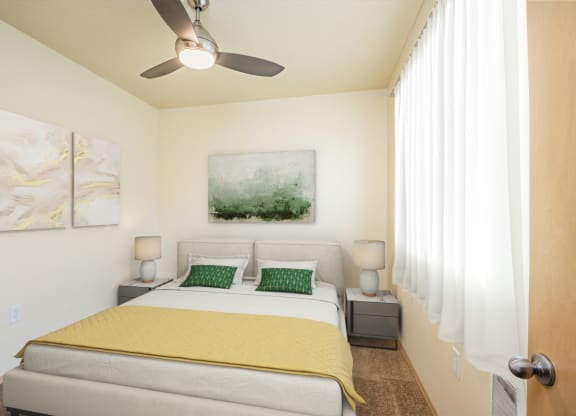 a bedroom with a bed and a ceiling fan