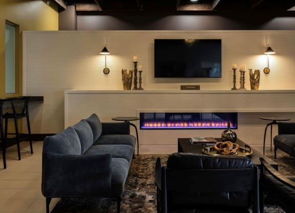 a living room with a couch and a tv