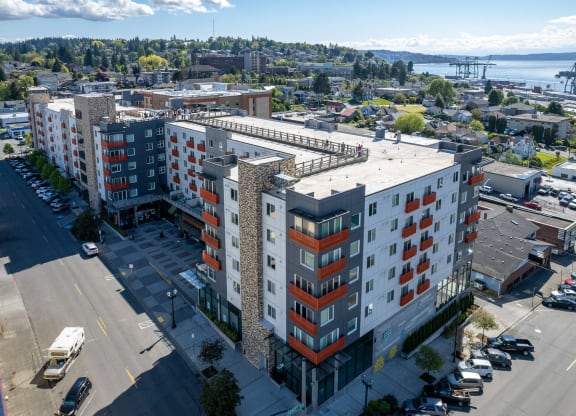 Apartments in Everett WA - The Waterline - Exterior View of The Apartment Building with Lush Landscaping