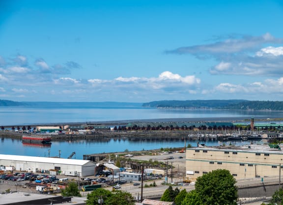 Apartments in Everett WA - The Waterline - Exterior View of The Apartment Building with Lush Landscaping