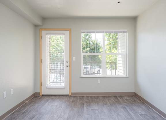 A room with a door and a window.