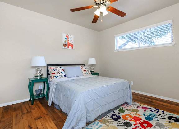 Bedroom With Ceiling Fan at Boston Woods Apartments, San Antonio TX, 78201