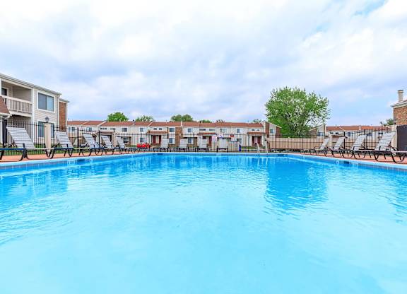 A large swimming pool in a residential area.