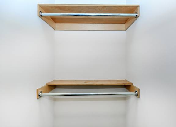 Two shelves on a wall.