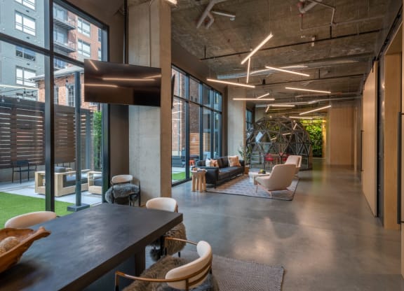 the interior of a large office space with furniture and large windows at The Audubon New Haven, New Haven, Connecticut