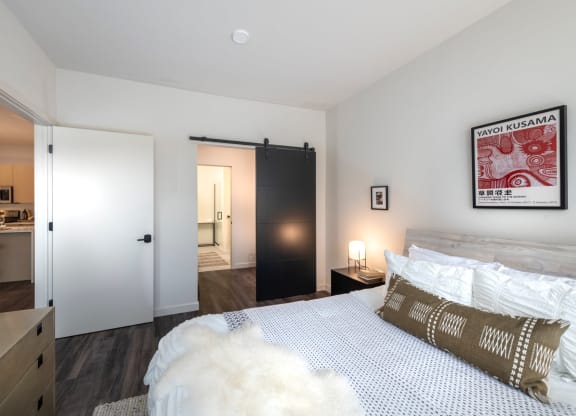 a bedroom with a bed and a closet at The Audubon New Haven, Connecticut, 06511