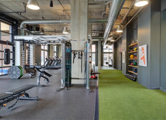 a gym with a bunch of exercise equipment in it at The Audubon New Haven, Connecticut