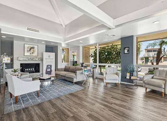 A living room with a fireplace and a couch.