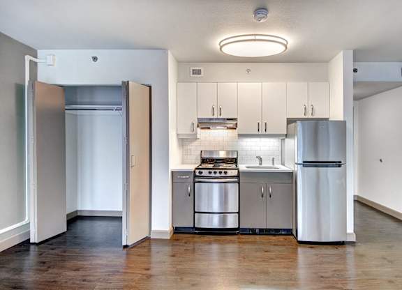 Kitchen with wooden floor at Cosmopolitan, Seattle, WA, 98105