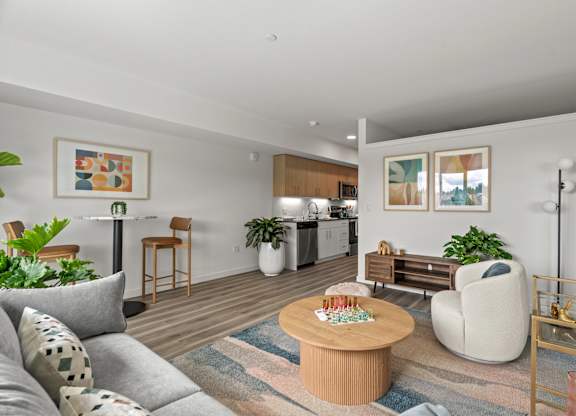 a living room with a couch and a table at Baldwyn, Seattle, WA