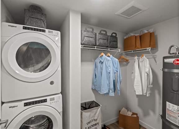 a laundry room with a washing machine and a dryer at Baldwyn, Seattle, WA 98125