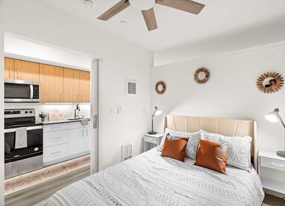 a bedroom with a bed and a ceiling fan at Baldwyn, Washington, 98125