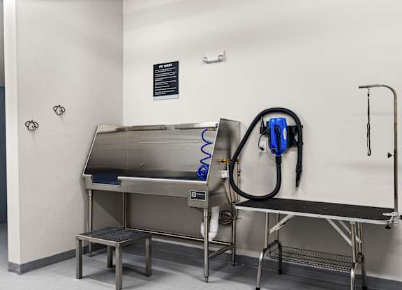 a sink and a machine in a room at Baldwyn, Seattle, 98125