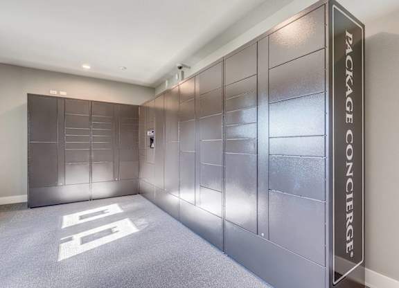 A hallway with a sign that says Package Concierge.