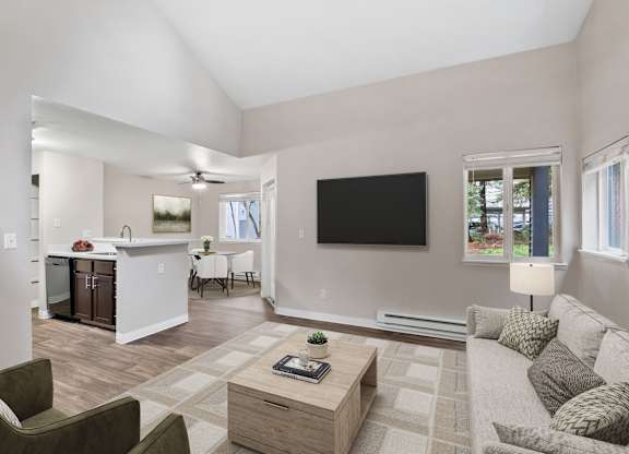 A living room with a couch, chair, and coffee table.
